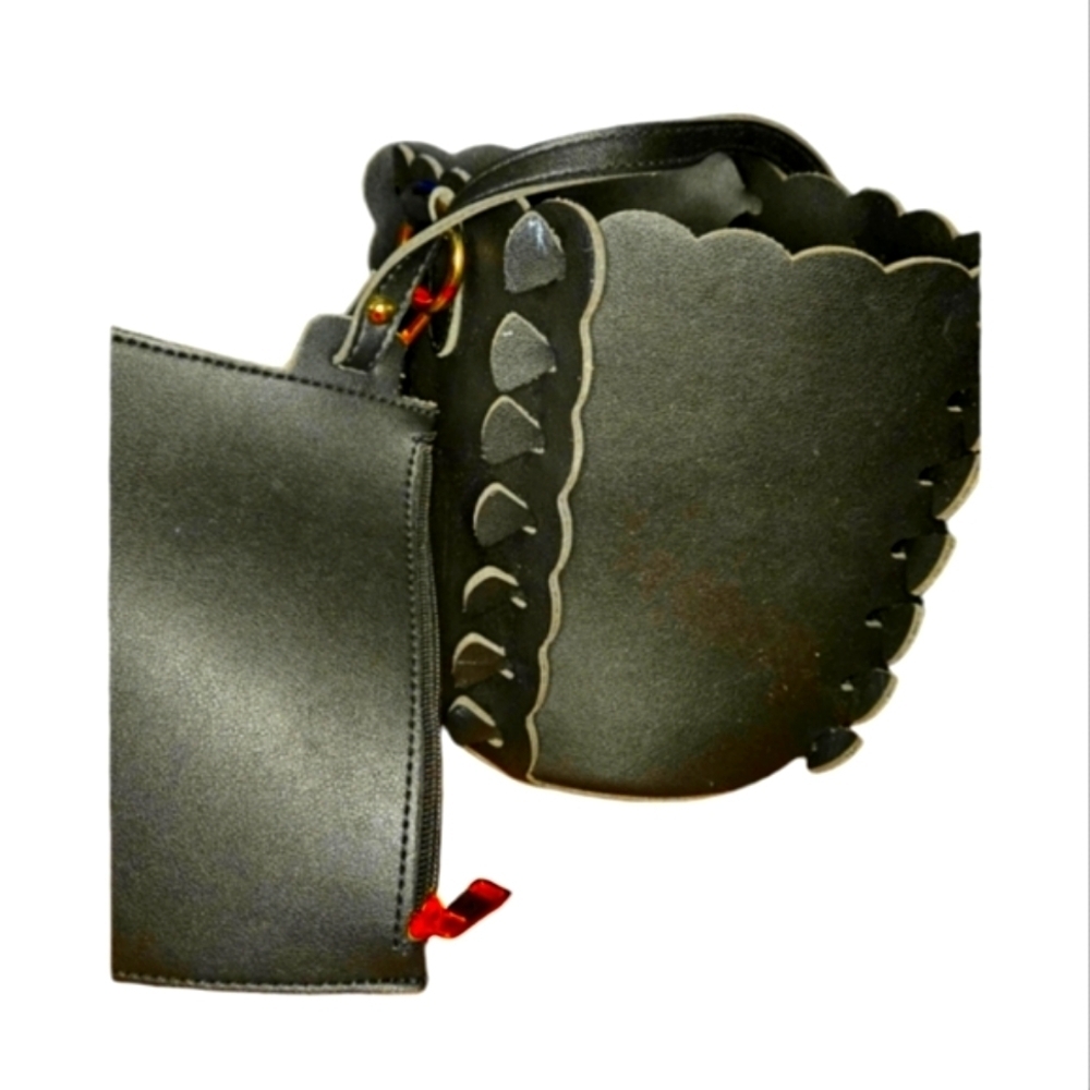 Black leather bucket bag with pouch insert.